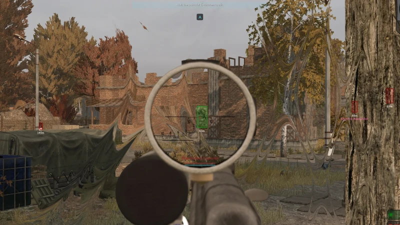 Scoped in on a player glowing green through the scope with distance markers